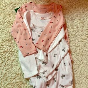 Three long-sleeve onesies